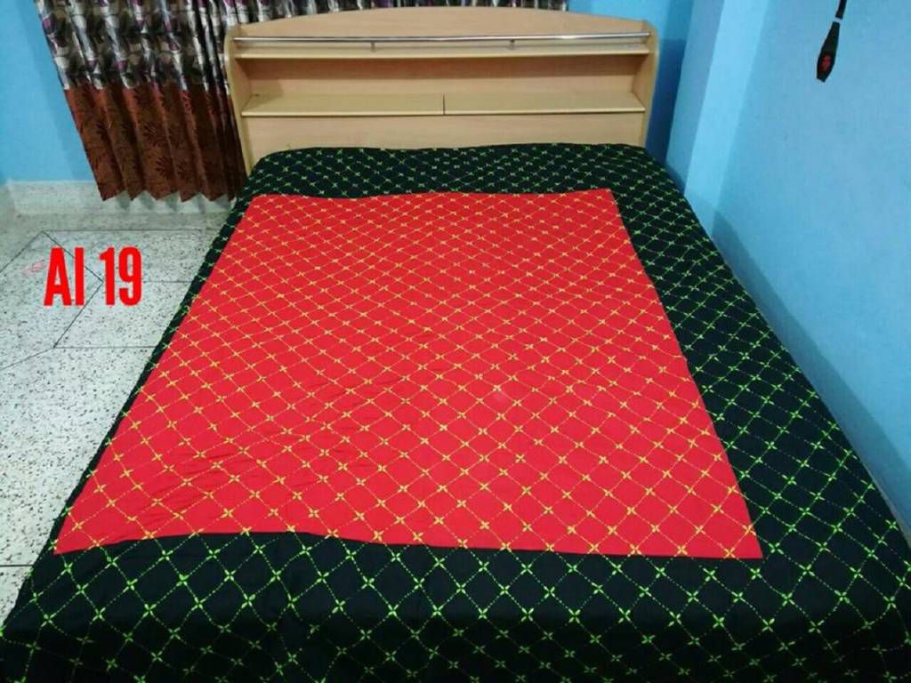 Black with red hand stitched nokshi katha
