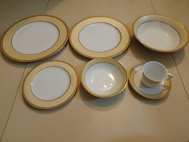 Brand new 52 piece Protik porcelain dinner set